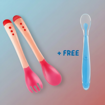 Two pink utensils with red ends and a blue spoon on a white background